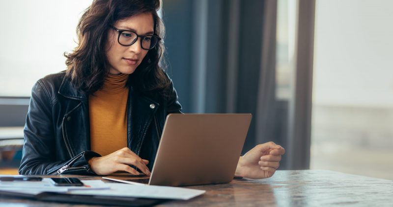 Asian woman working laptop at office